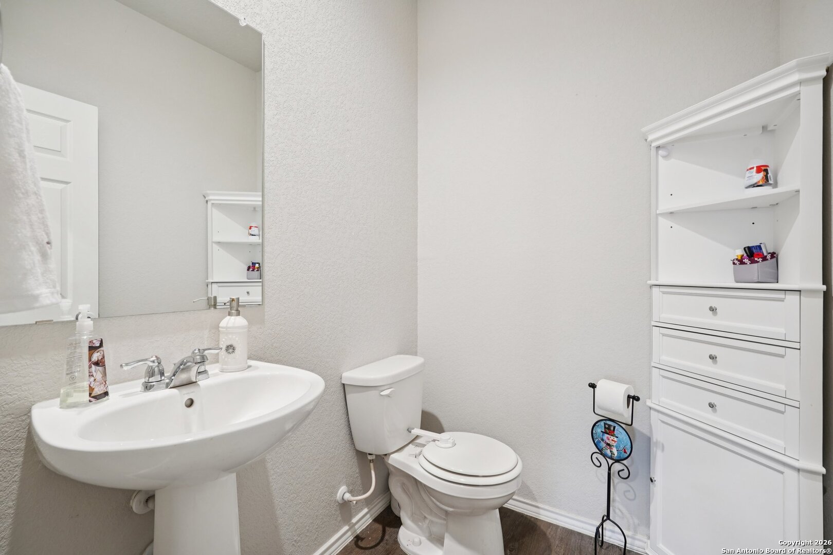 13030 Heathers Reef St. Hedwig, TX 78152 - Photo 26 of 51 a bathroom with a sink toilet and a mirror