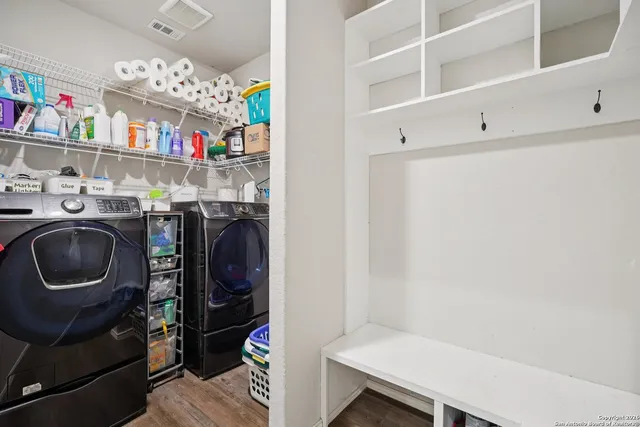 a en suite bathroom with a sink and mirror