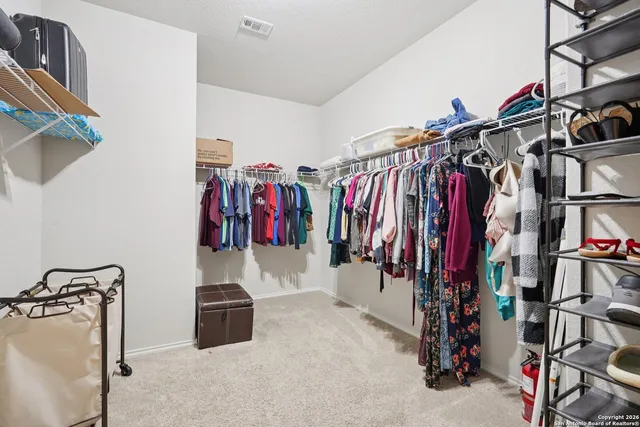 a room with a sink and a window