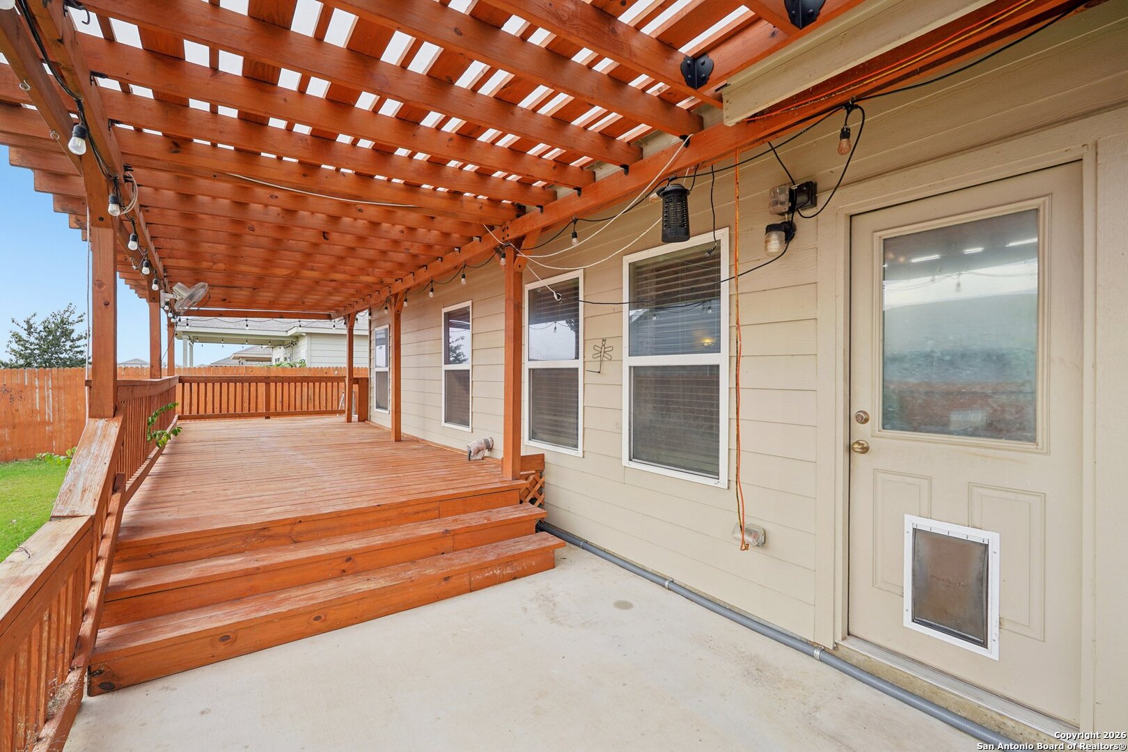 13030 Heathers Reef St. Hedwig, TX 78152 - Photo 35 of 51 a backyard of a house with dishwasher and outdoor seating