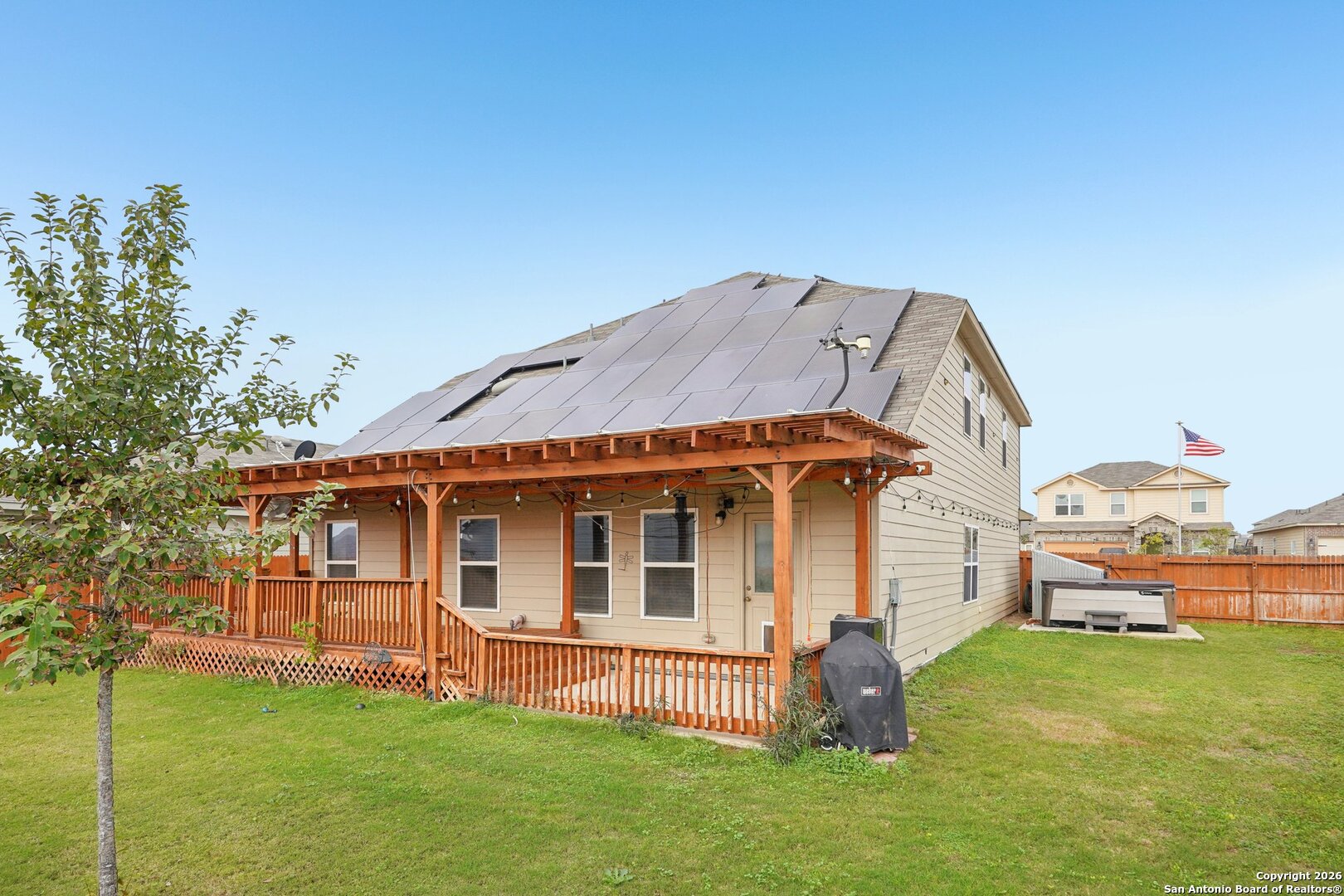 13030 Heathers Reef St. Hedwig, TX 78152 - Photo 38 of 51 a backyard of a house with table and chairs