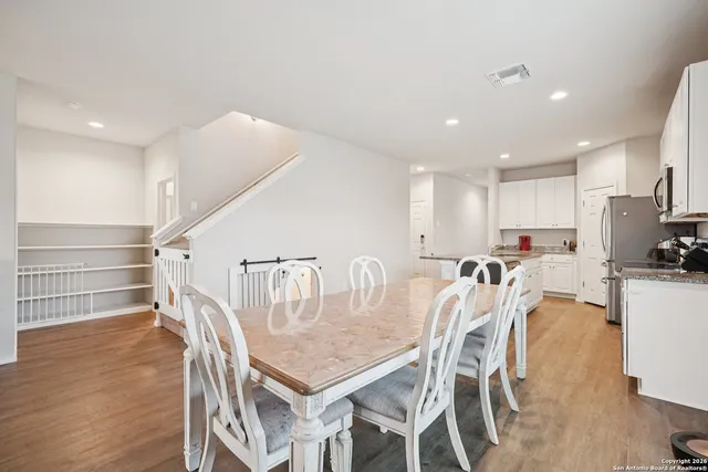 a view of a dining room with furniture