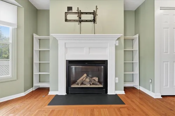 a living room with a fireplace
