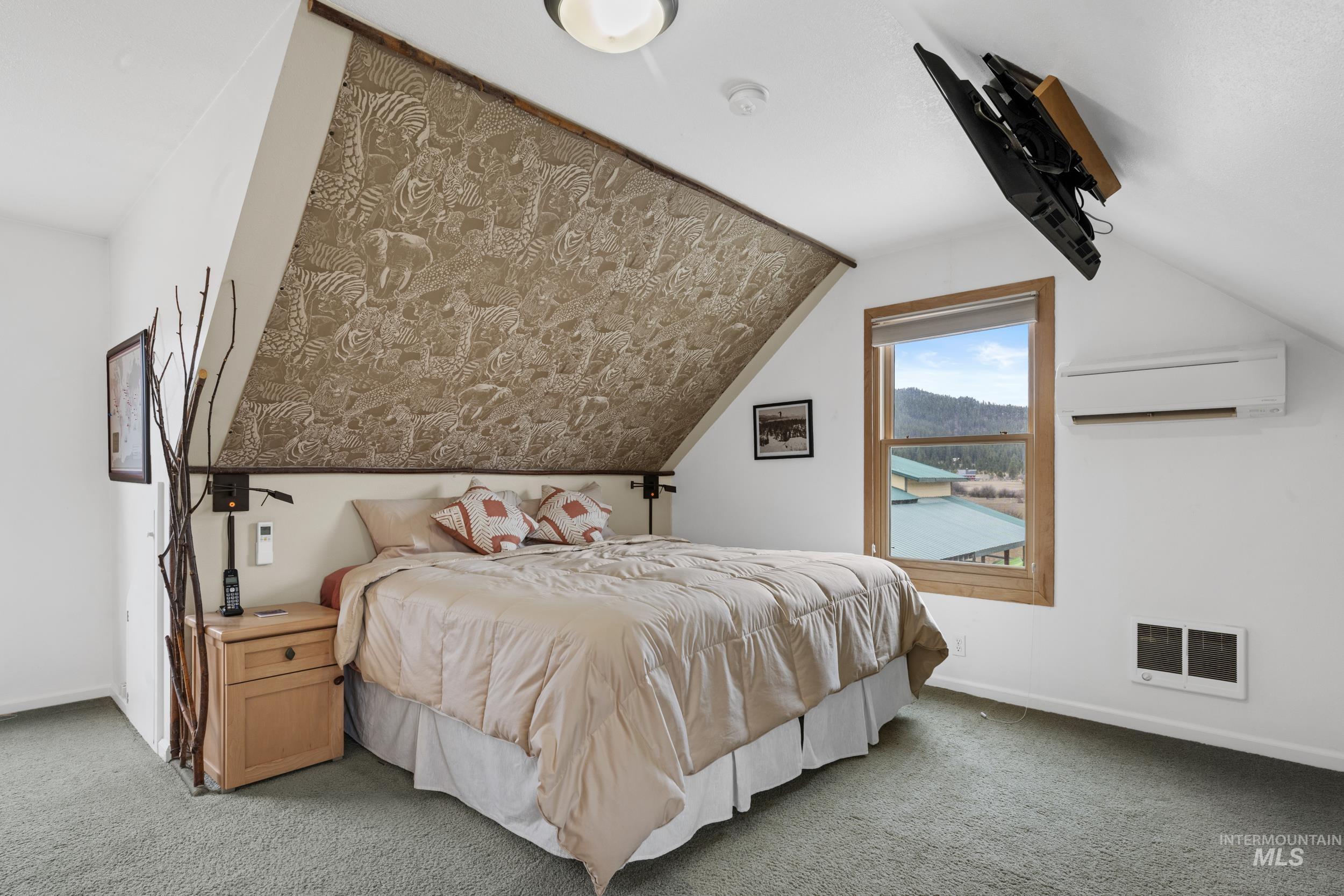 69 River Ranch Road Garden Valley, ID 83622 - Photo 23 of 50 Bedroom featuring carpet and heating unit