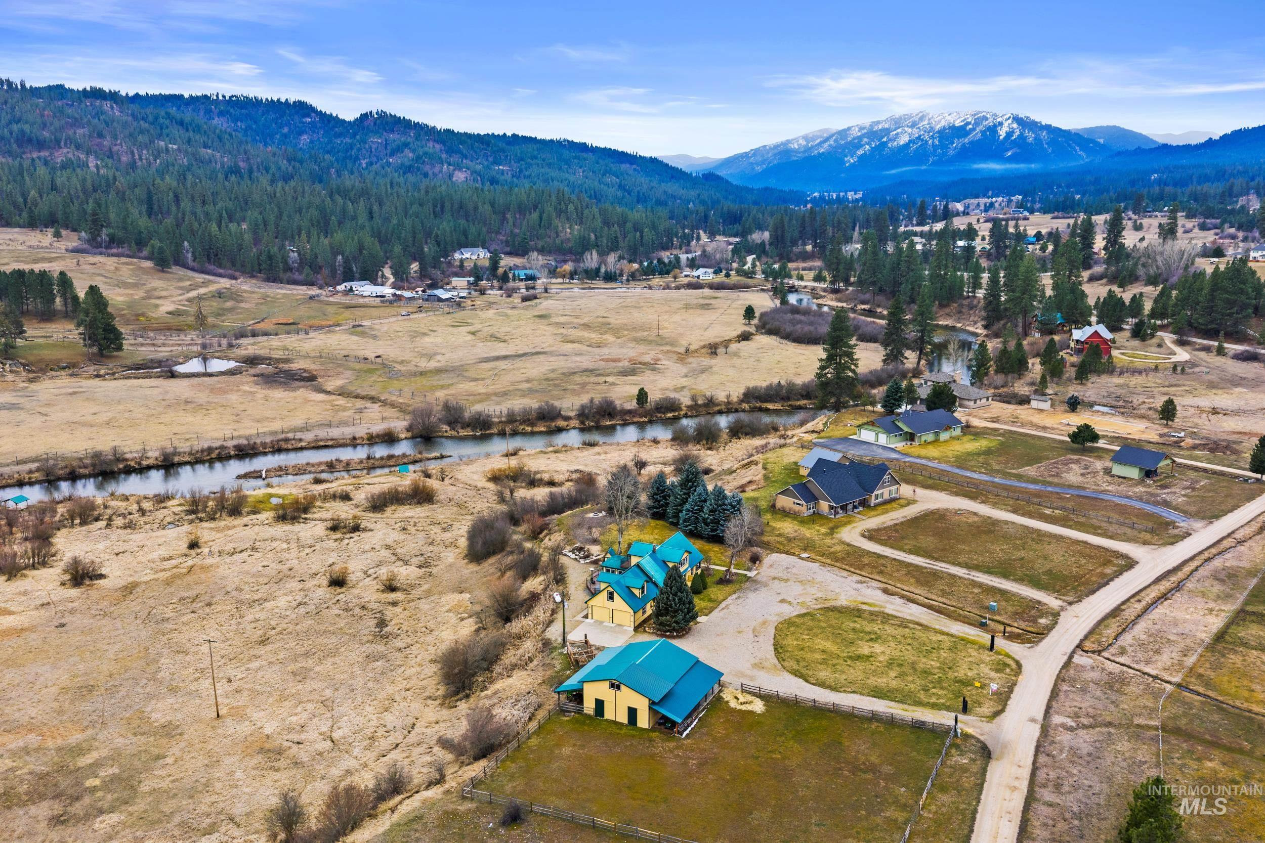 69 River Ranch Road Garden Valley, ID 83622 - Photo 47 of 50 Drone / aerial view of a water and mountain view