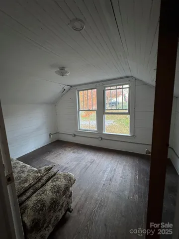 a view of hallway with livingroom