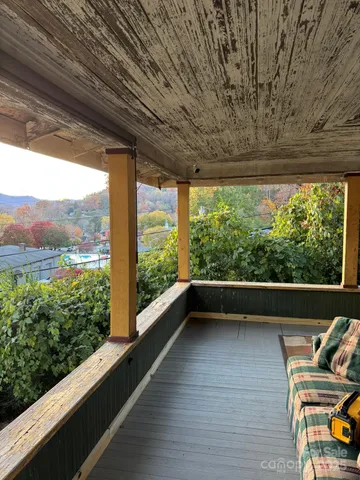 a view of swimming pool with seating space