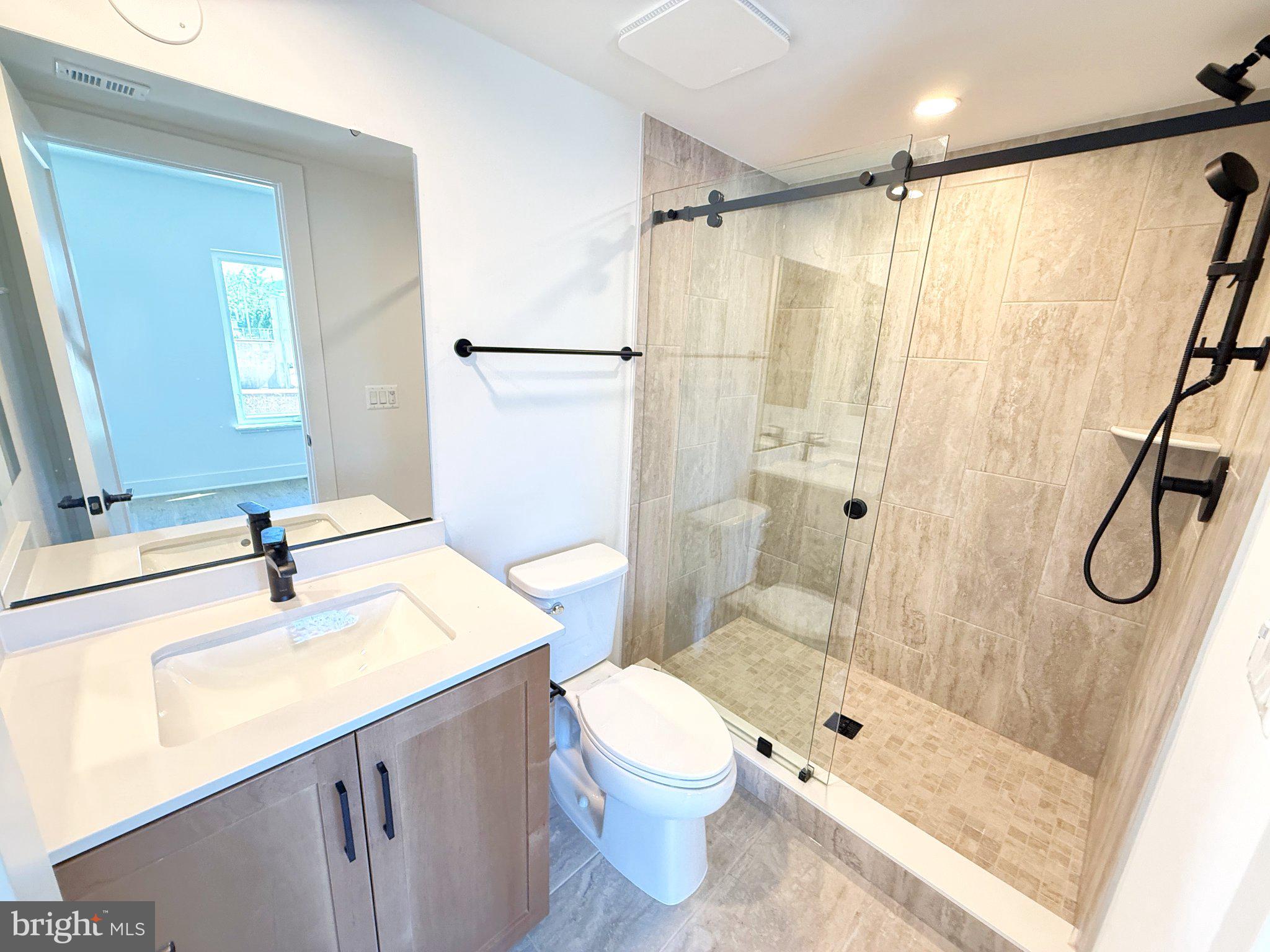 33 Lower Service Court Northwest Washington, DC 20001 - Photo 12 of 51 Modern bathroom with sleek finishes.