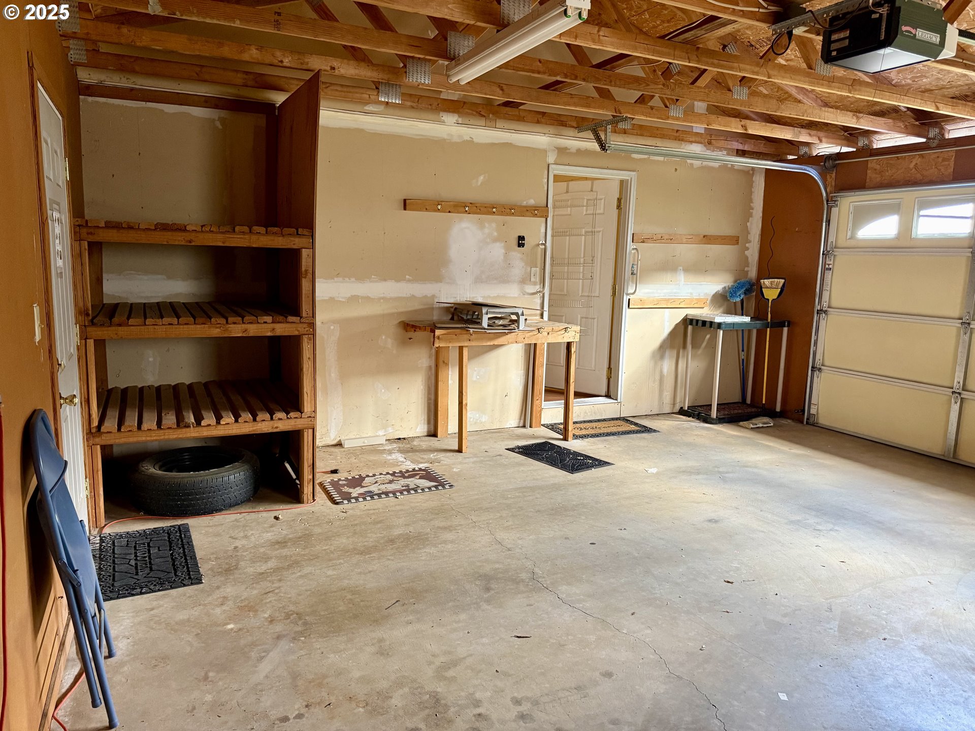 Undisclosed Address Canyonville, OR 97417 - Photo 16 of 24 a view of walk in closet with clothes and shoes