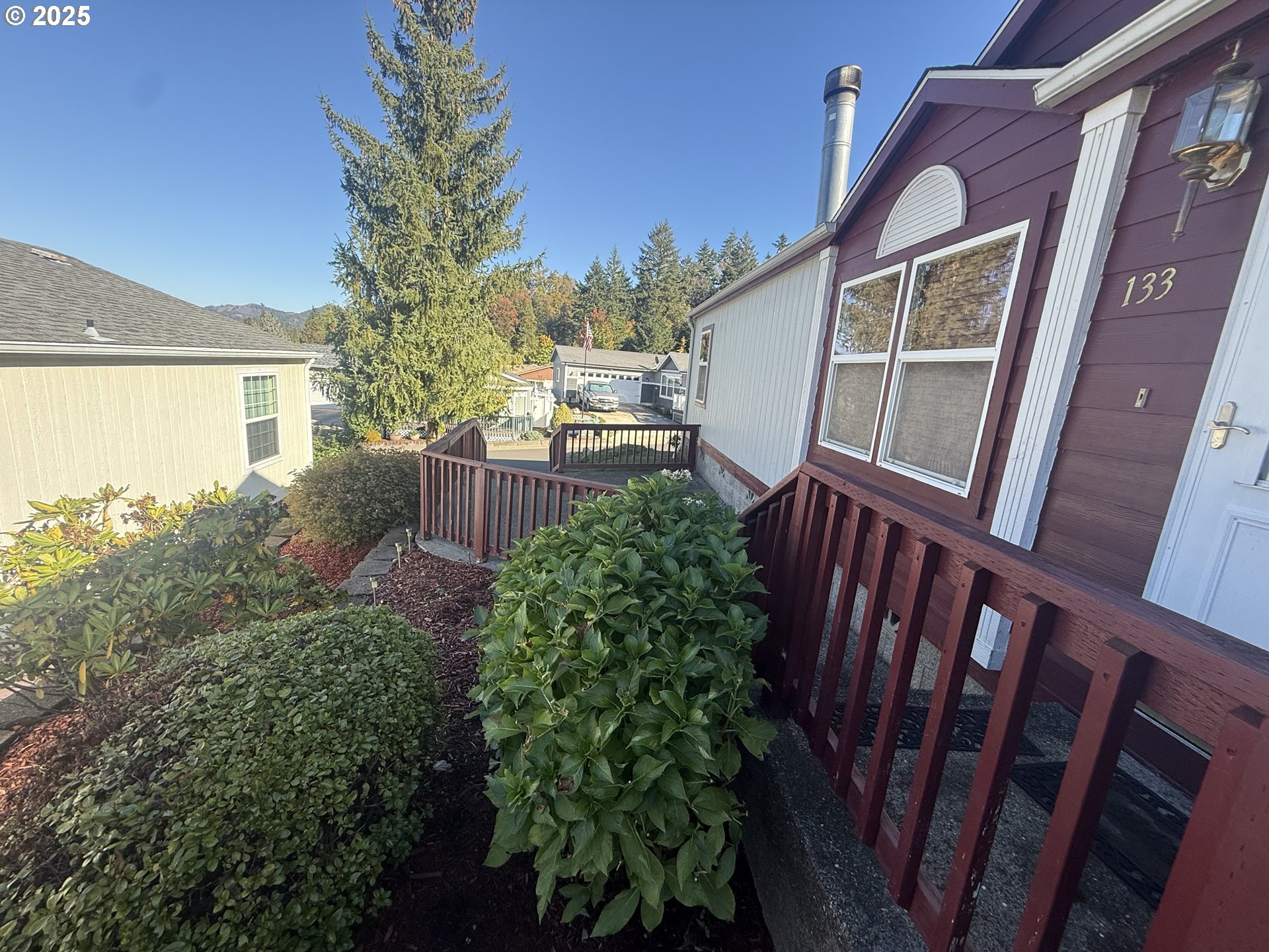 Undisclosed Address Canyonville, OR 97417 - Photo 20 of 24 a view of a house with backyard and garden