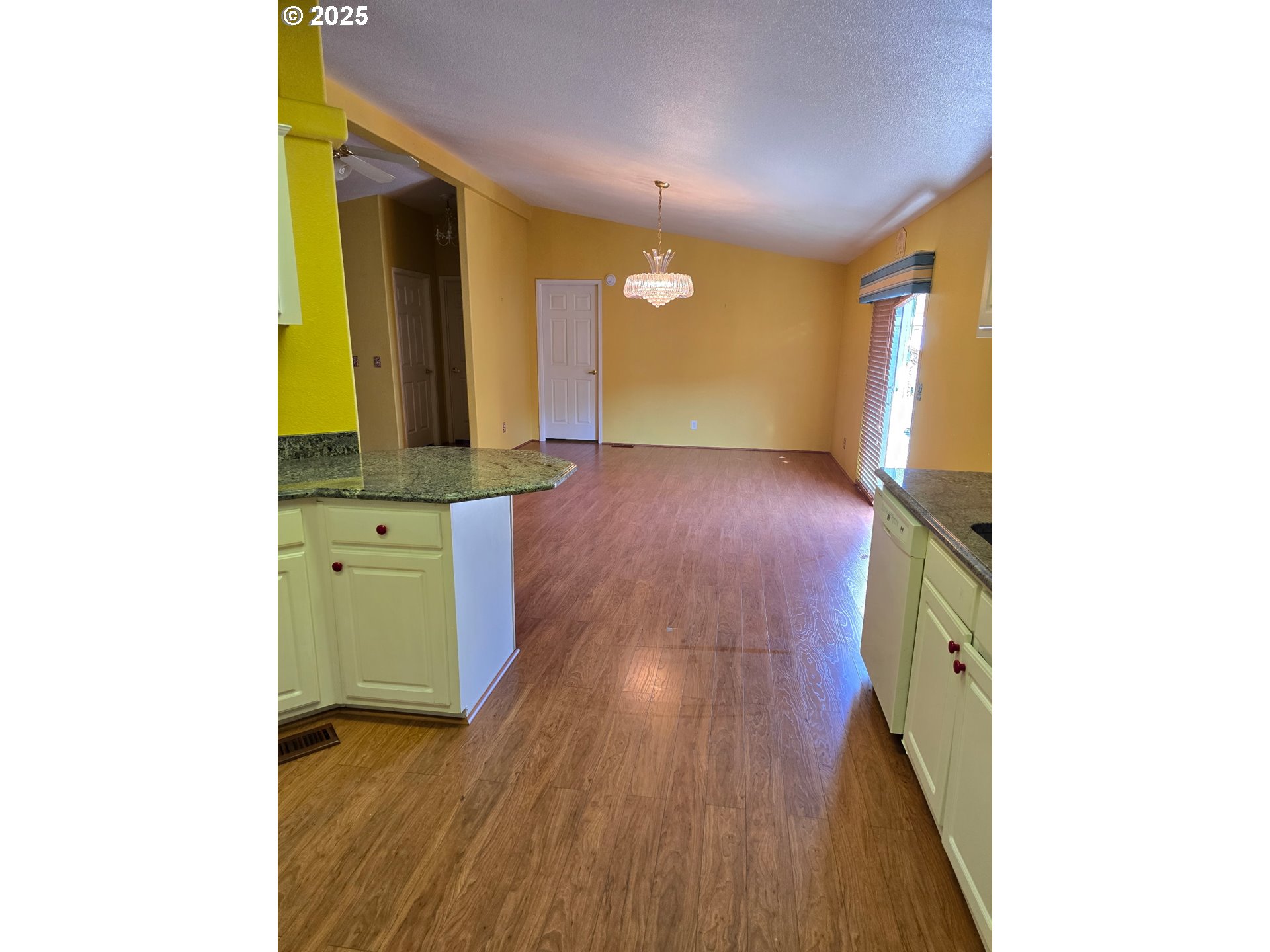 Undisclosed Address Canyonville, OR 97417 - Photo 7 of 24 a view of a hallway with wooden floor