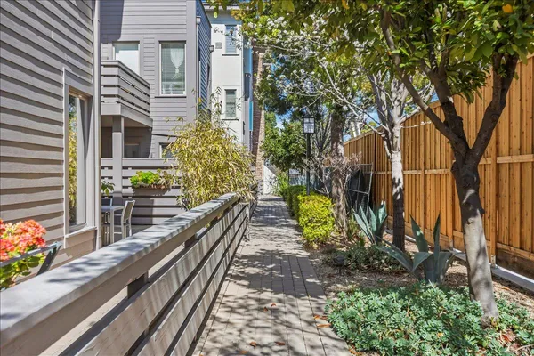 a view of a backyard with sitting area
