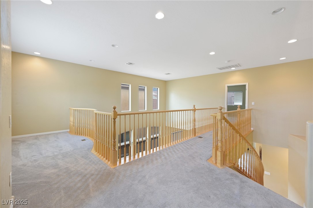 2289 Manosque Lane Henderson, NV 89044 - Photo 15 of 35 Corridor featuring an upstairs landing, recessed lighting, and carpet flooring