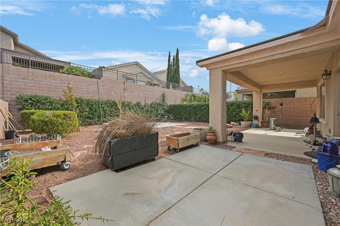 2289 Manosque Lane Henderson, NV 89044 - Photo 33 of 35 Fenced backyard with a patio