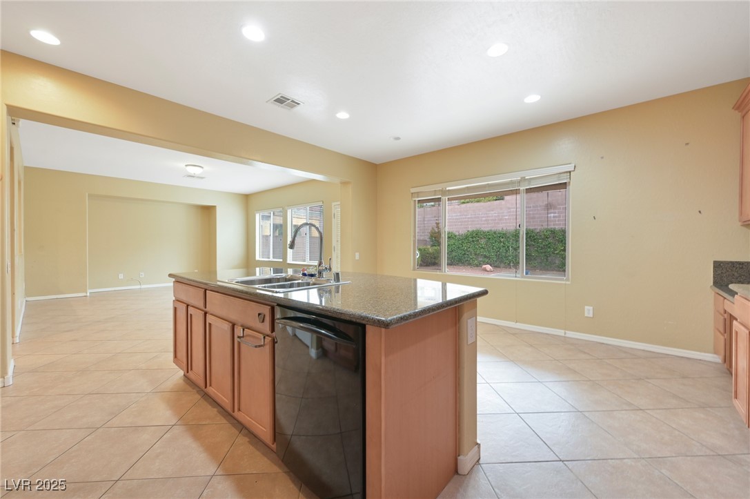 2289 Manosque Lane Henderson, NV 89044 - Photo 9 of 35 Kitchen with black dishwasher, recessed lighting, light tile patterned floors, and healthy amount of natural light