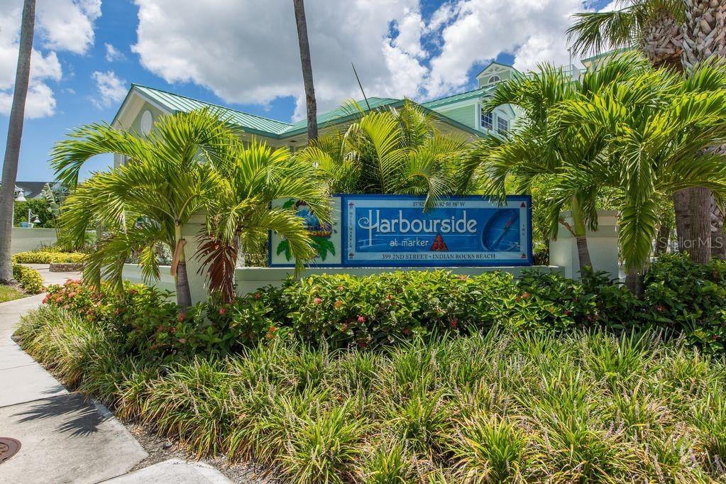 399 2nd Street, Unit 215 Indian Rocks Beach, FL 33785 - Photo 36 of 51 a sign that is sitting in front of a building