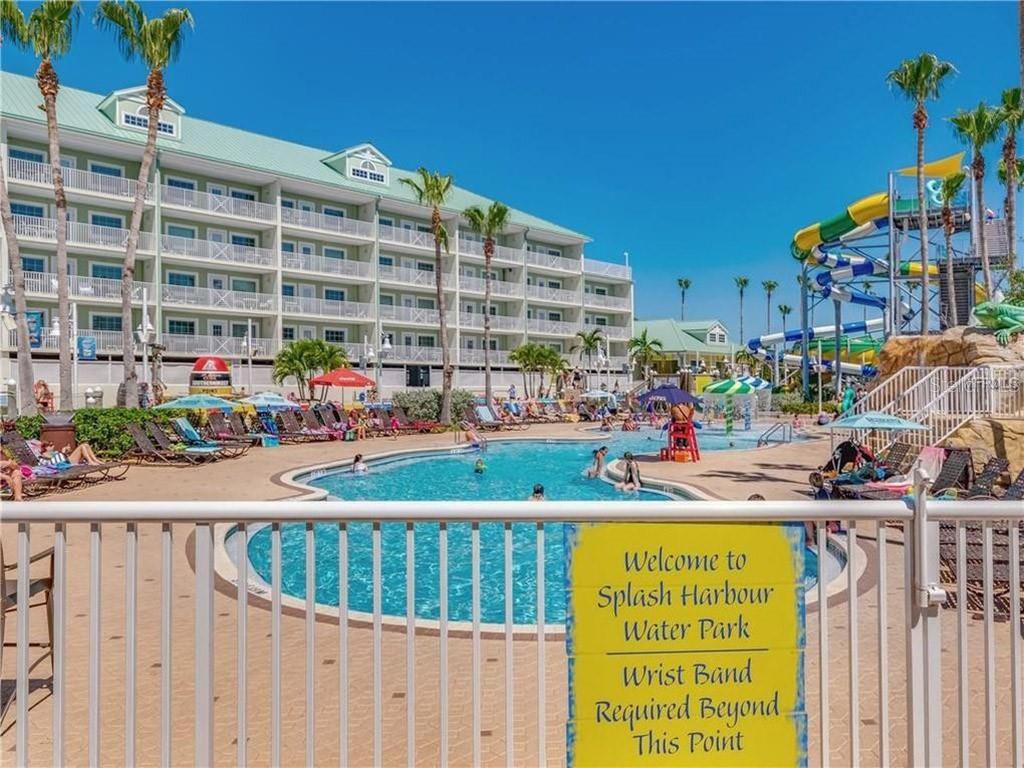 399 2nd Street, Unit 215 Indian Rocks Beach, FL 33785 - Photo 39 of 51 a view of building with an outdoor space