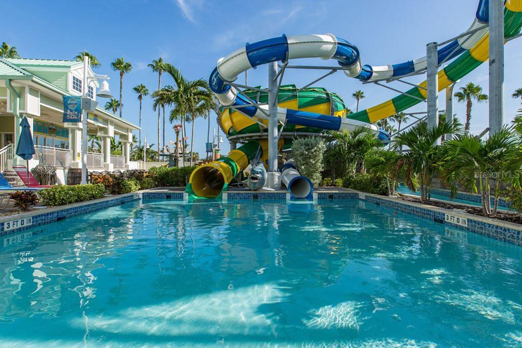 399 2nd Street, Unit 215 Indian Rocks Beach, FL 33785 - Photo 41 of 51 a view of yard with swimming pool