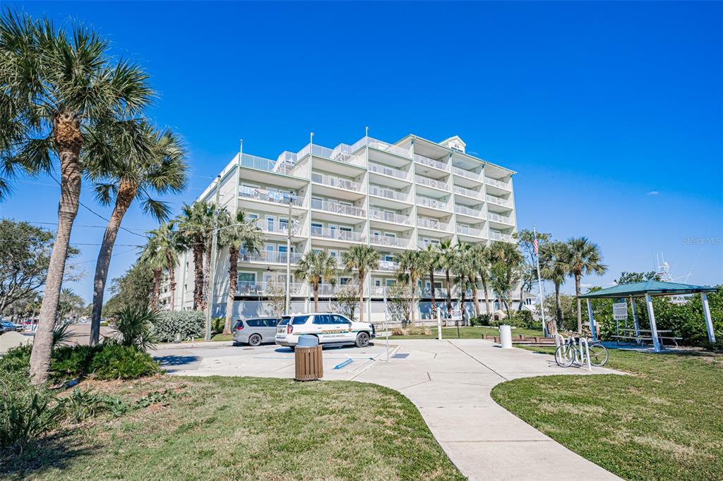 399 2nd Street, Unit 215 Indian Rocks Beach, FL 33785 - Photo 47 of 51 a building view with outdoor seating space