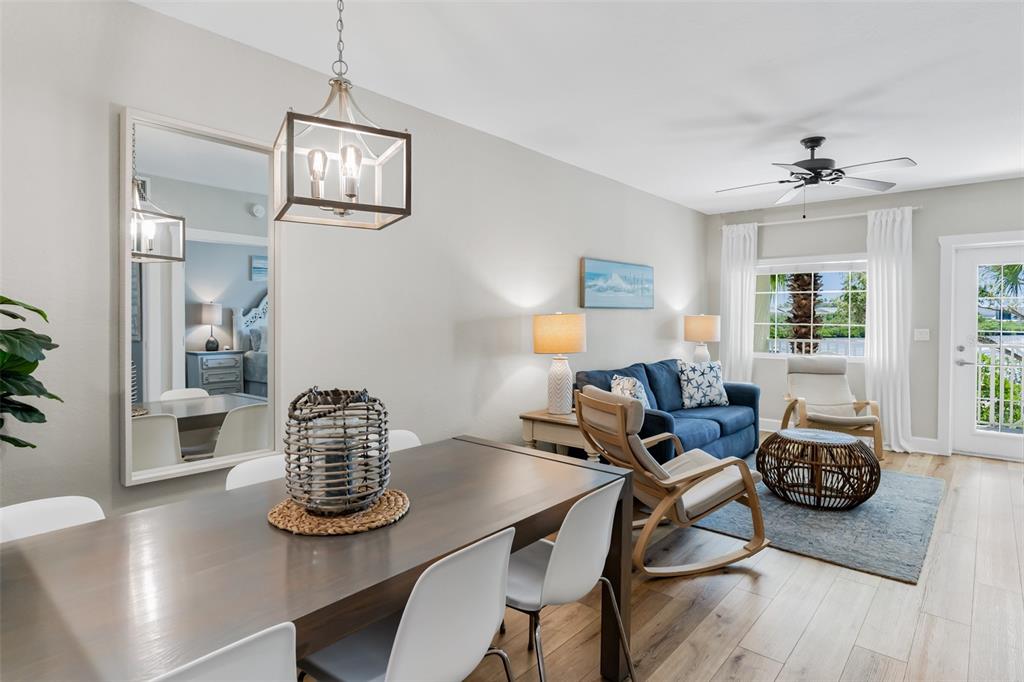 399 2nd Street, Unit 215 Indian Rocks Beach, FL 33785 - Photo 10 of 51 a work room with furniture wooden floor and window