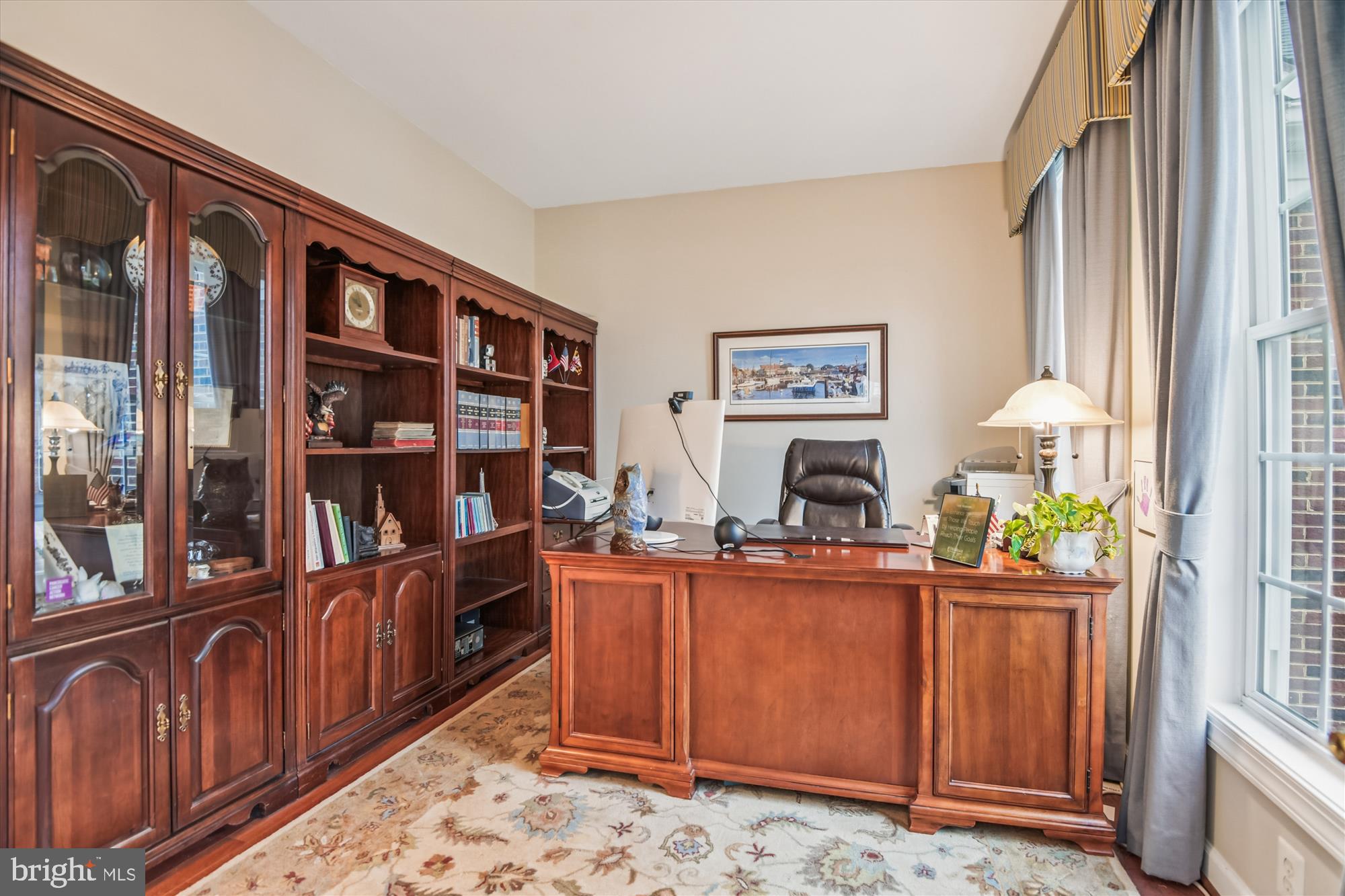 1584 Star Stella Drive Odenton, MD 21113 - Photo 11 of 45 a dining room with furniture and a book shelf