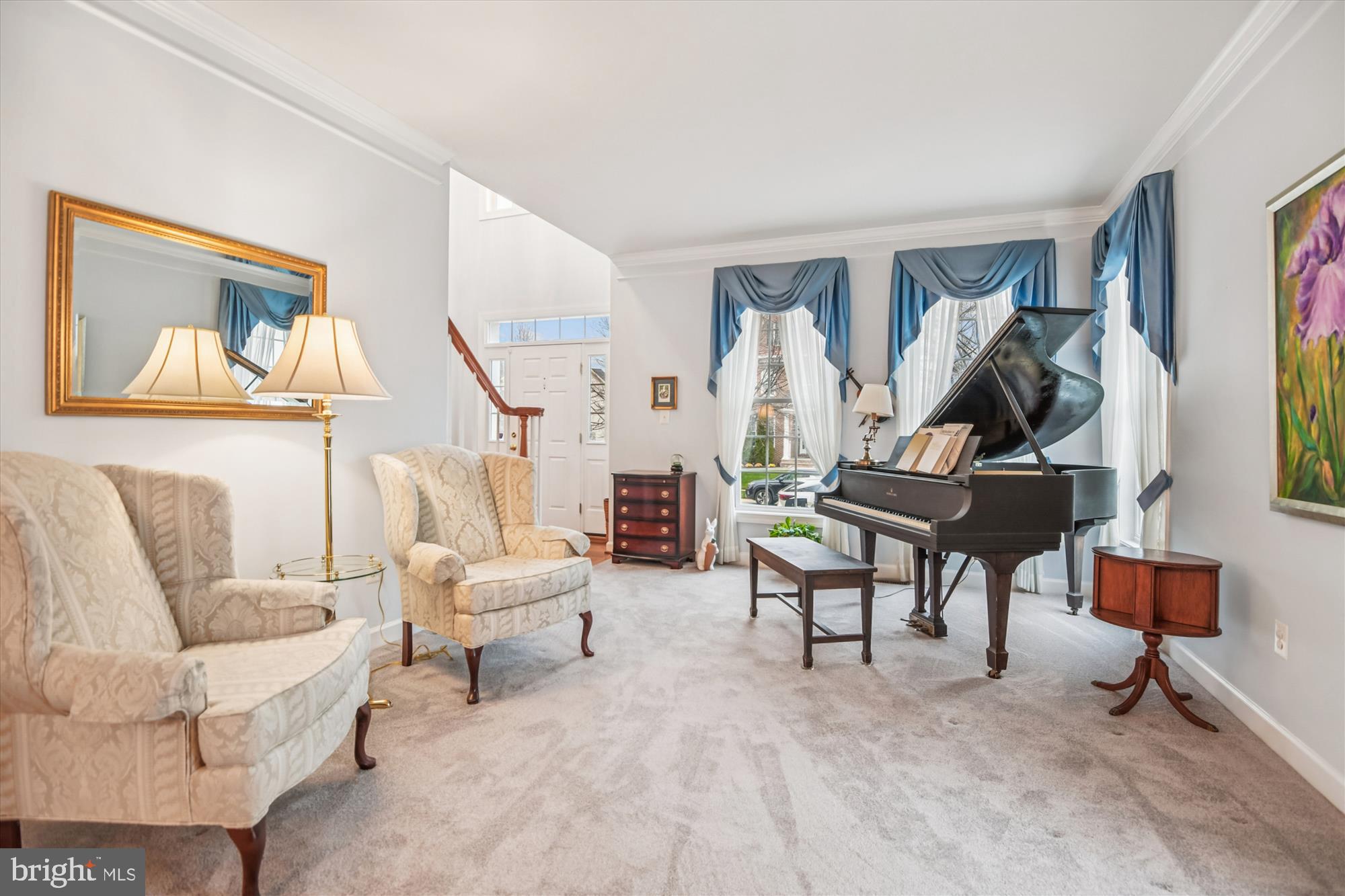 1584 Star Stella Drive Odenton, MD 21113 - Photo 15 of 45 a living room with furniture and a painting on the wall