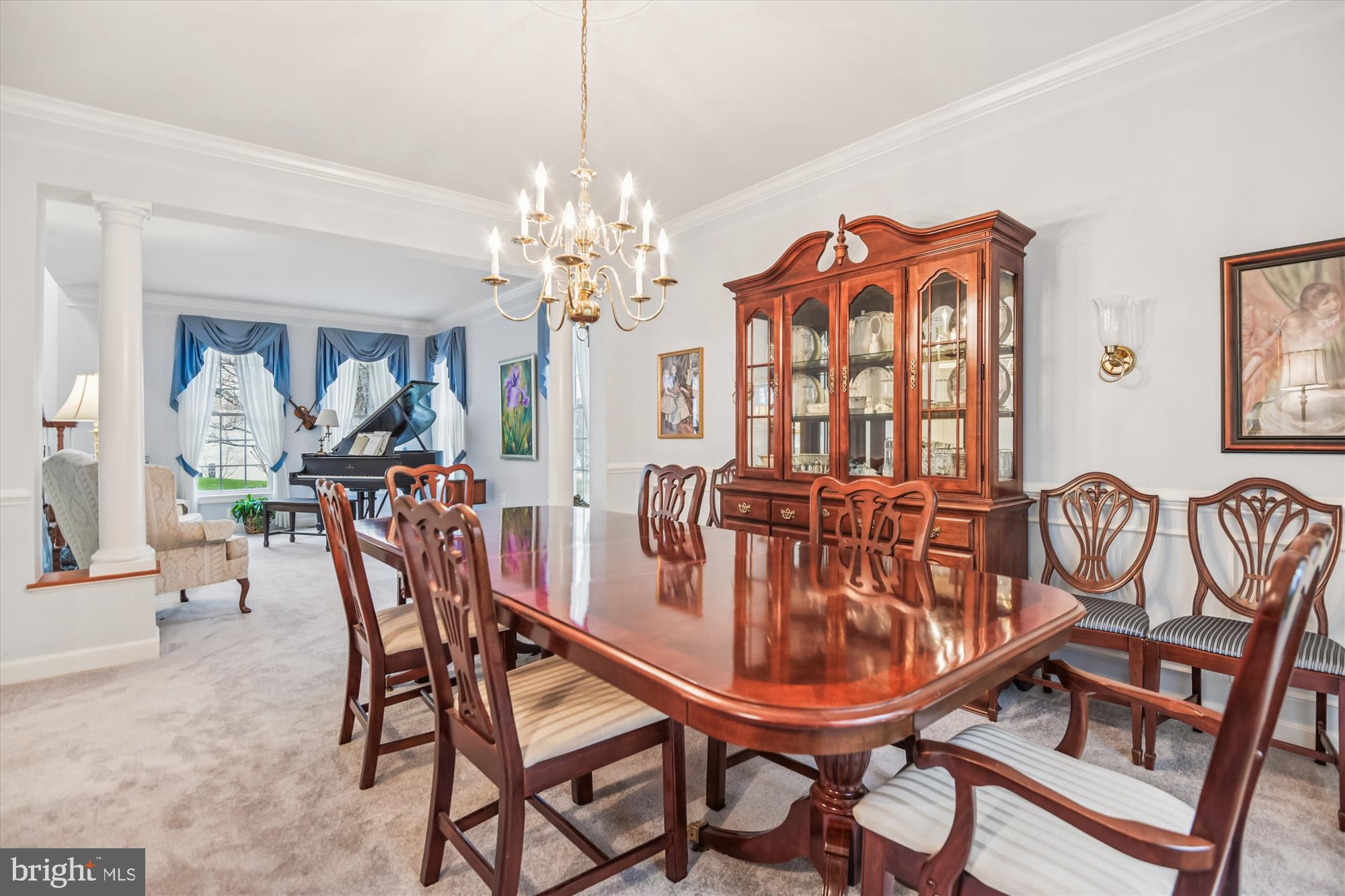 1584 Star Stella Drive Odenton, MD 21113 - Photo 19 of 45 a dining room with furniture a chandelier and wooden floor