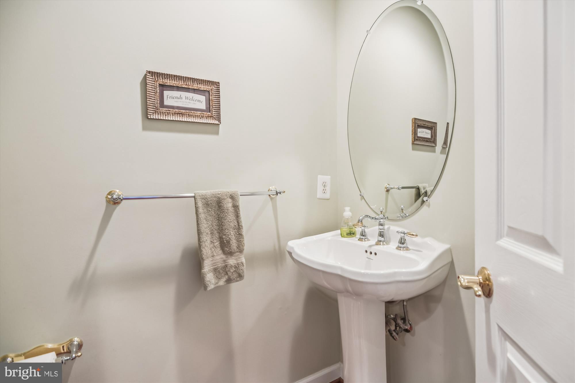 1584 Star Stella Drive Odenton, MD 21113 - Photo 21 of 45 a bathroom with a sink a mirror and vanity