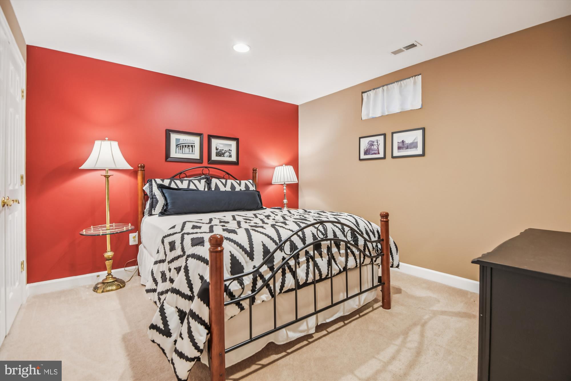 1584 Star Stella Drive Odenton, MD 21113 - Photo 34 of 45 a bedroom with a bed and a lamp on table