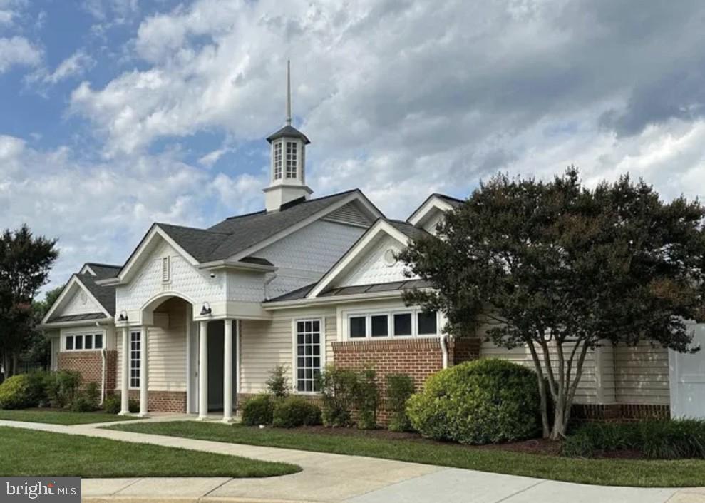 1584 Star Stella Drive Odenton, MD 21113 - Photo 43 of 45 a front view of a house with a garden