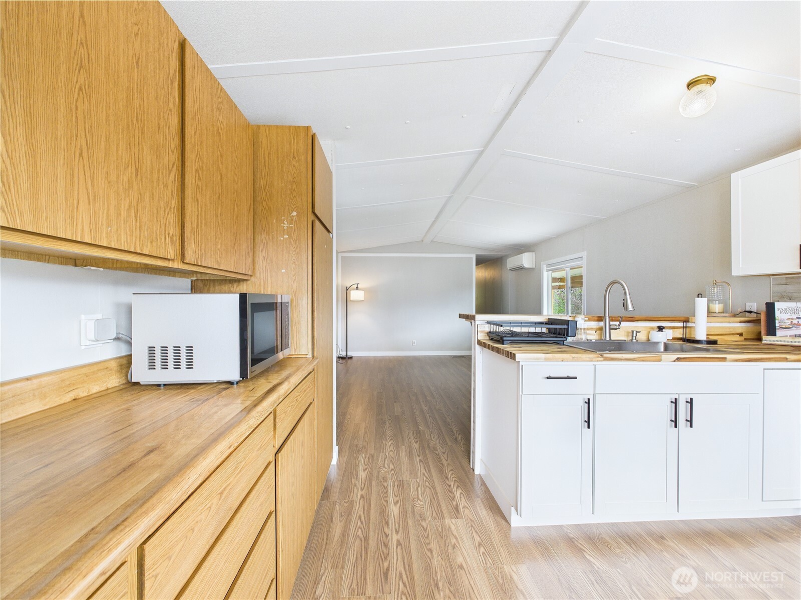 212 Old Owen Road, Unit 43 Sultan, WA 98294 - Photo 8 of 22 a large kitchen with cabinets