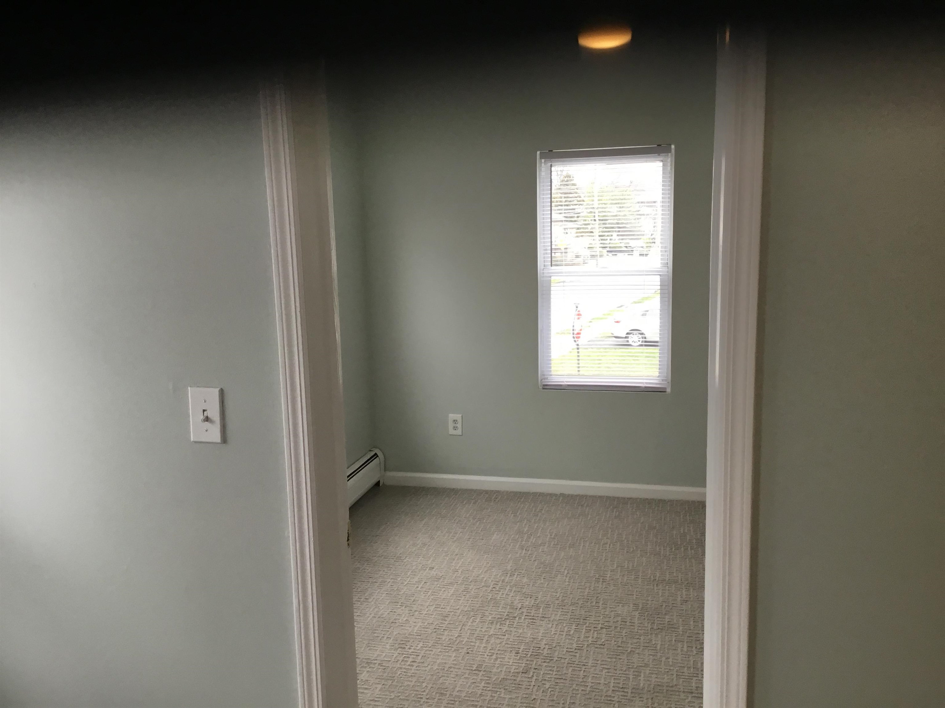 90 Union Avenue, Unit 2 Little Ferry, NJ 07643 - Photo 21 of 25 an empty room with a window