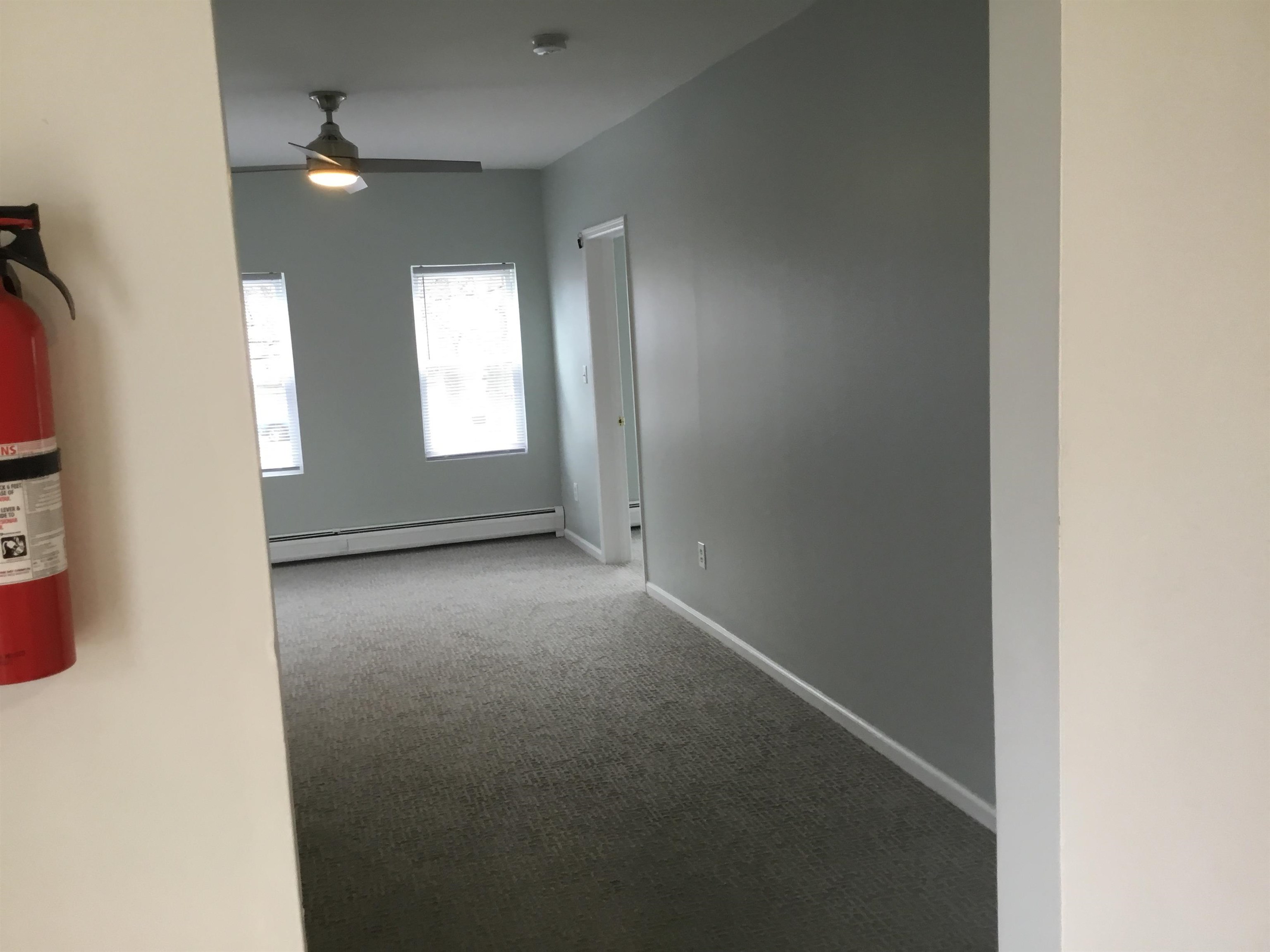 90 Union Avenue, Unit 2 Little Ferry, NJ 07643 - Photo 22 of 25 an empty room with windows