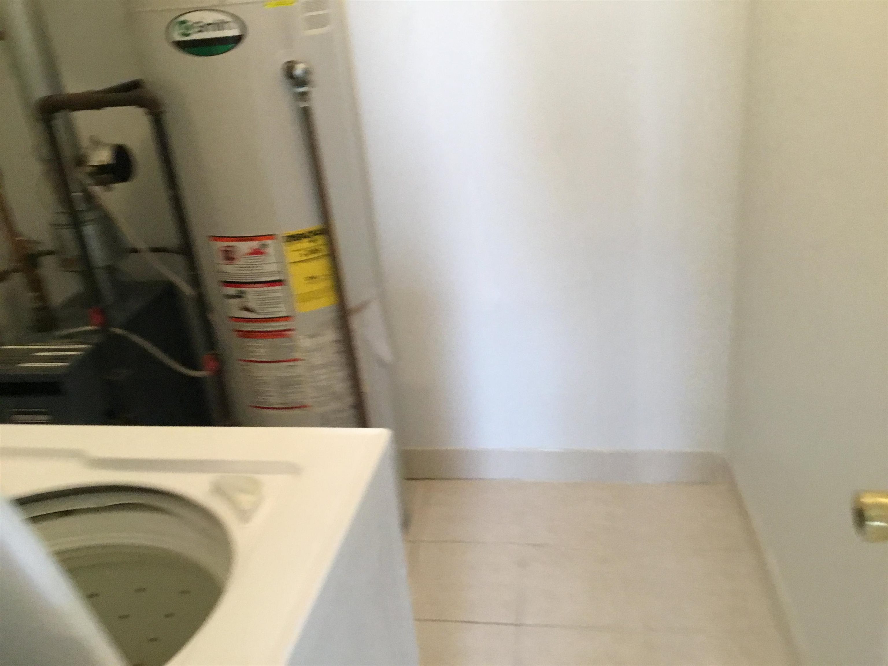 90 Union Avenue, Unit 2 Little Ferry, NJ 07643 - Photo 24 of 25 a utility room with dryer and washer