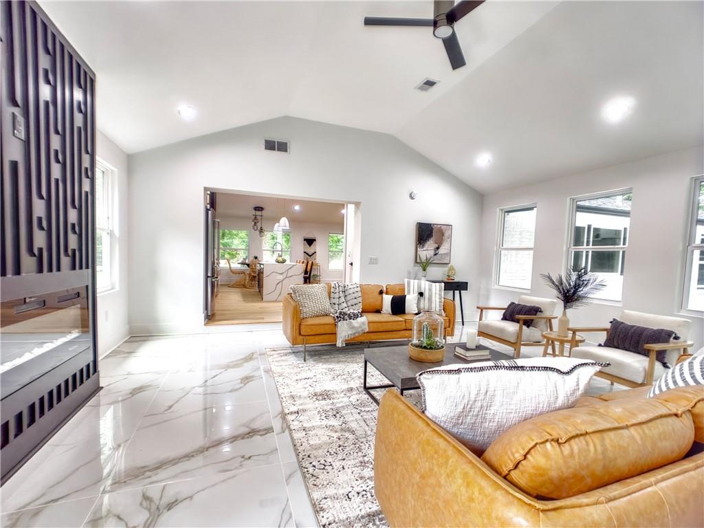 1521 Harbin Road Southwest Atlanta, GA 30311 - Photo 1 of 1 a living room with furniture and a large window