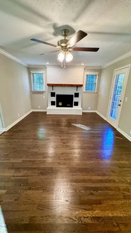 a view of kitchen and dining room with wooden floor