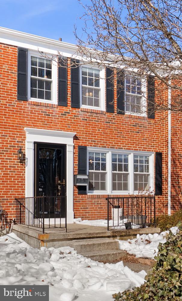 8204 Pleasant Plains Road Towson, MD 21286 - Photo 1 of 40 a front view of a house with a yard