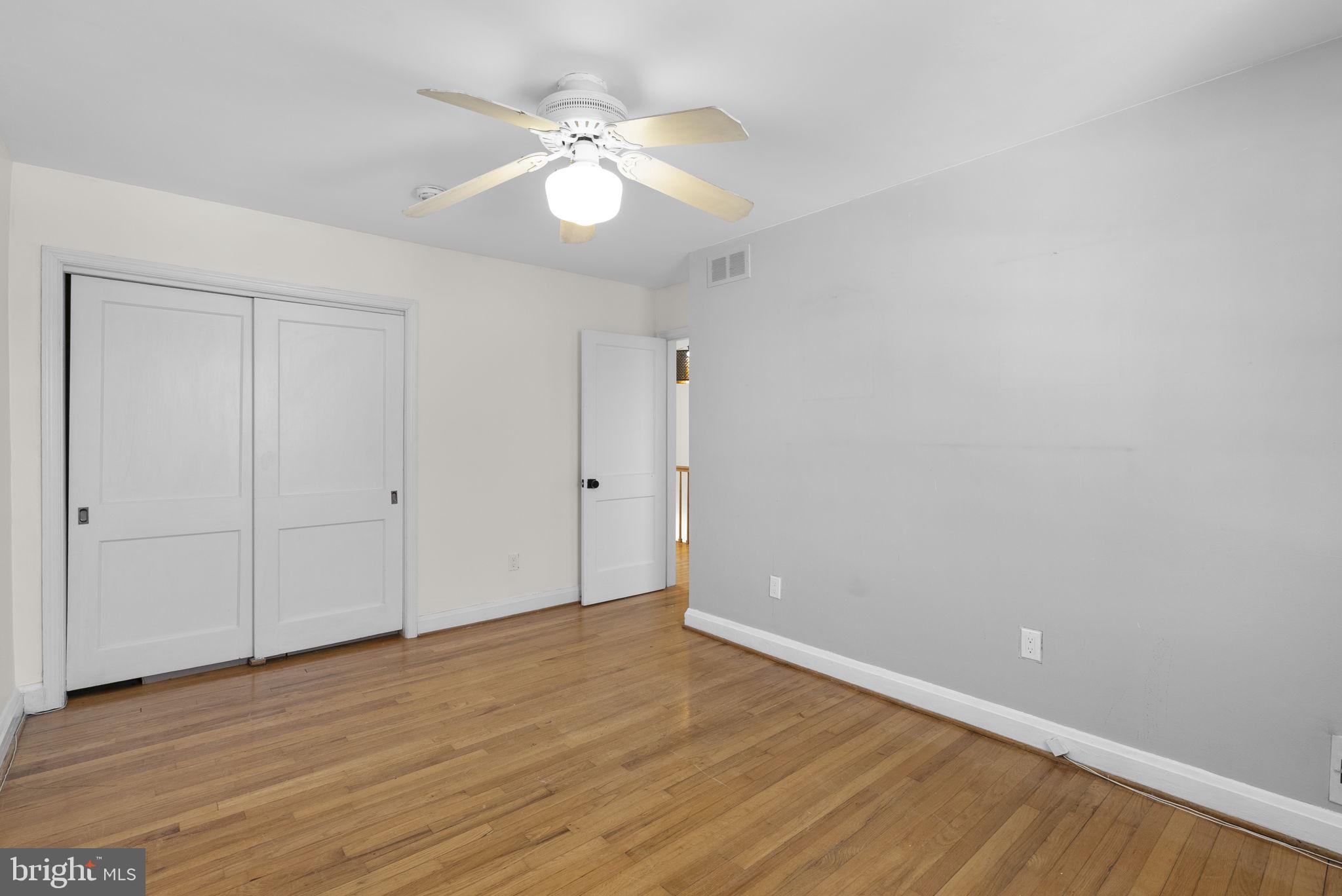 8204 Pleasant Plains Road Towson, MD 21286 - Photo 19 of 40 a view of an empty room with wooden floor