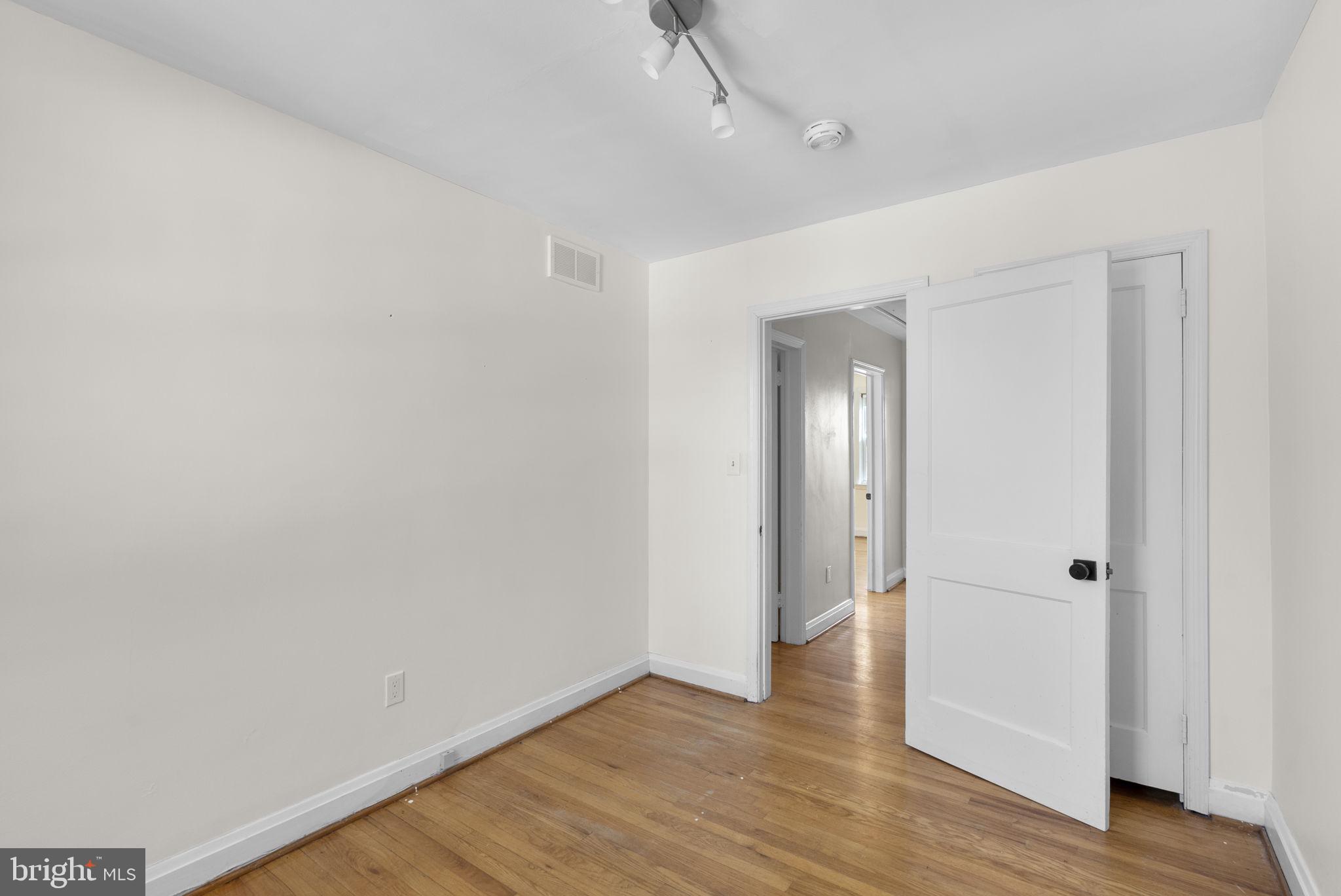 8204 Pleasant Plains Road Towson, MD 21286 - Photo 21 of 40 a view of an empty room with wooden floor