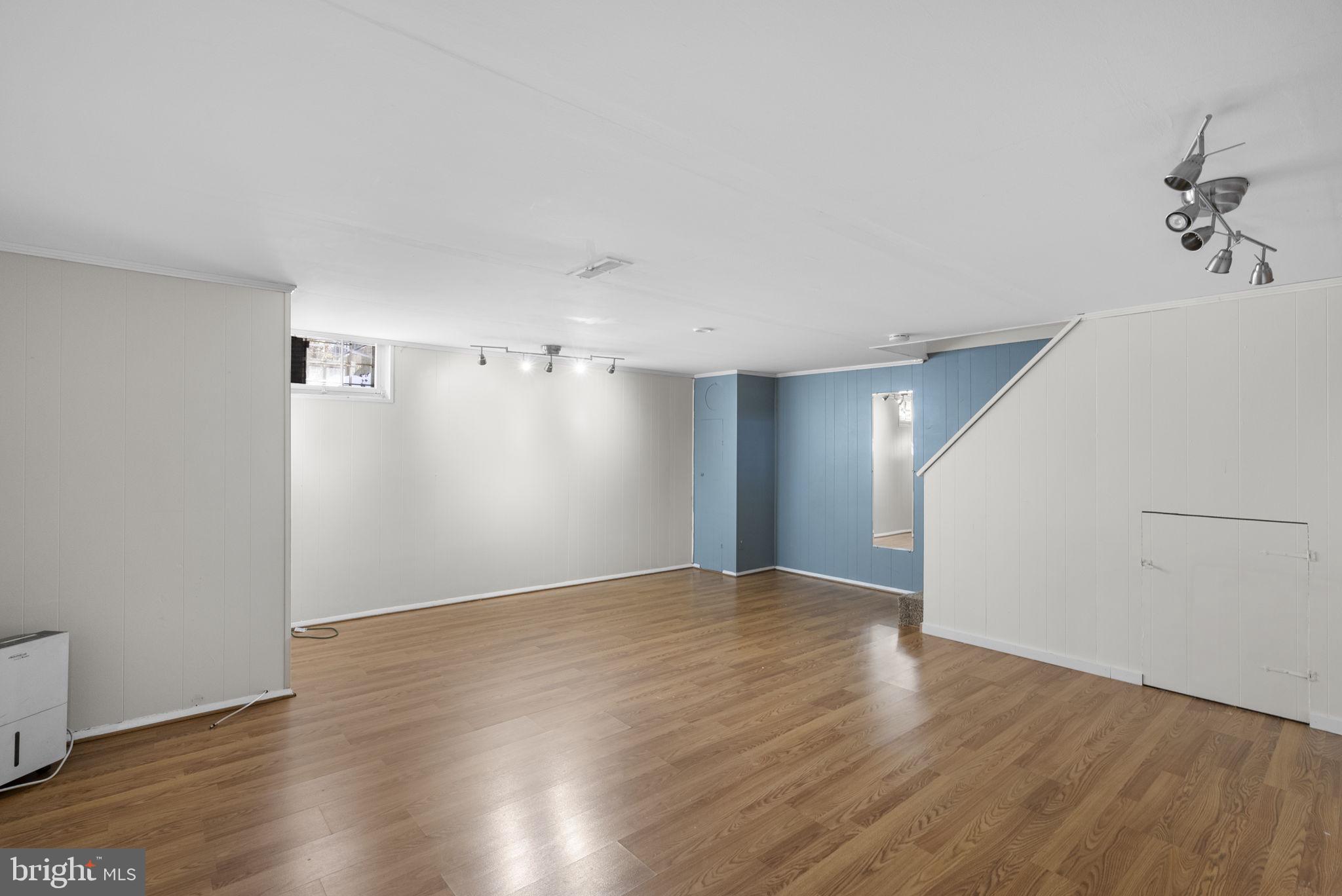 8204 Pleasant Plains Road Towson, MD 21286 - Photo 24 of 40 a view of an empty room with wooden floor