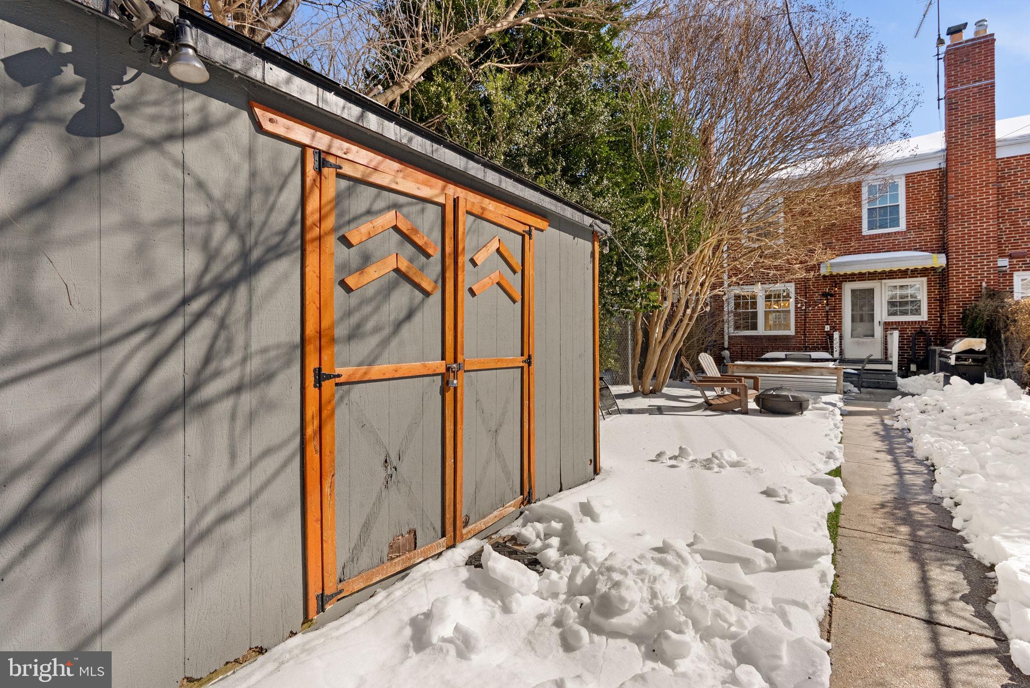 8204 Pleasant Plains Road Towson, MD 21286 - Photo 28 of 40 a view of a snow on the side of the road