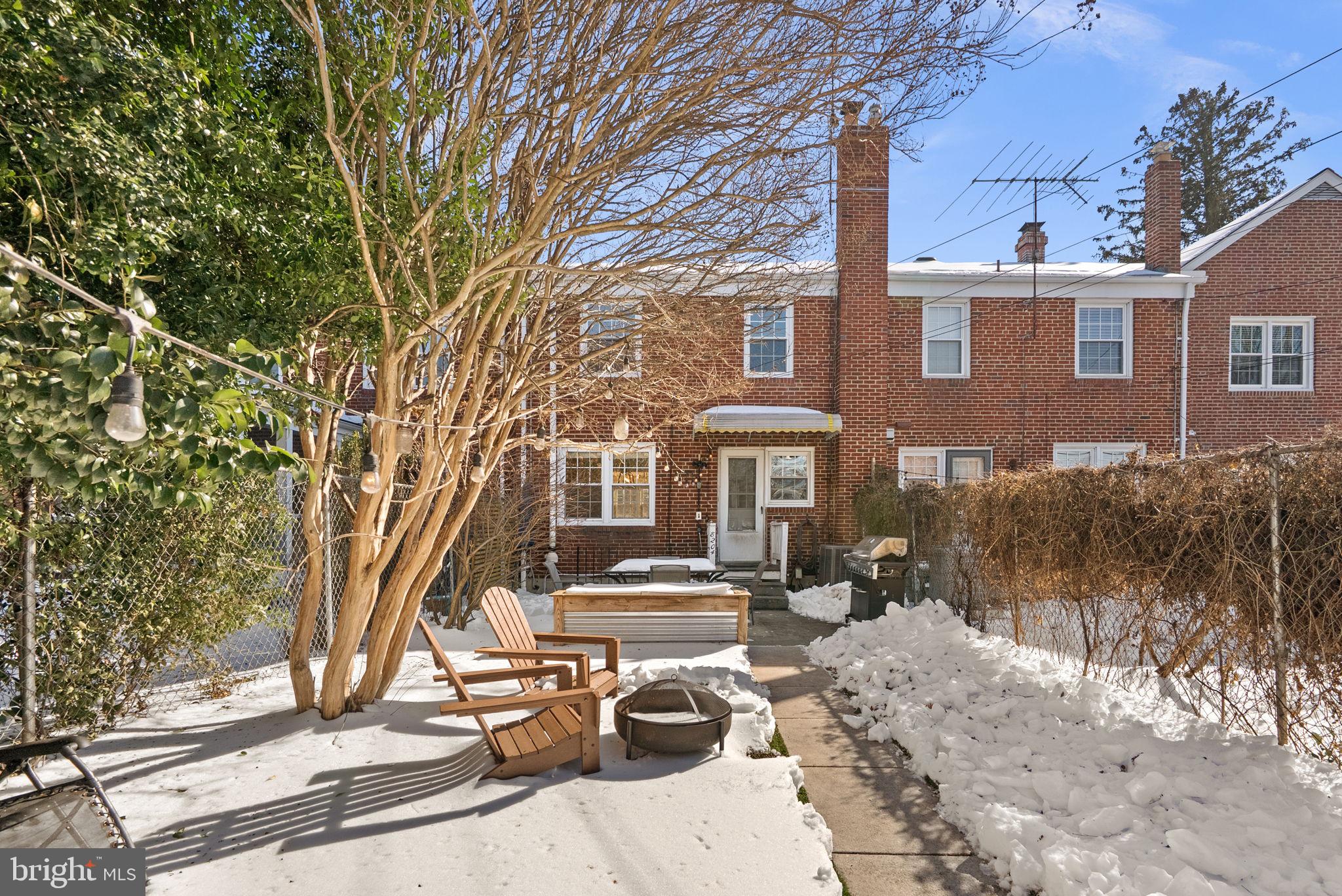 8204 Pleasant Plains Road Towson, MD 21286 - Photo 29 of 40 a view of a brick house with many windows