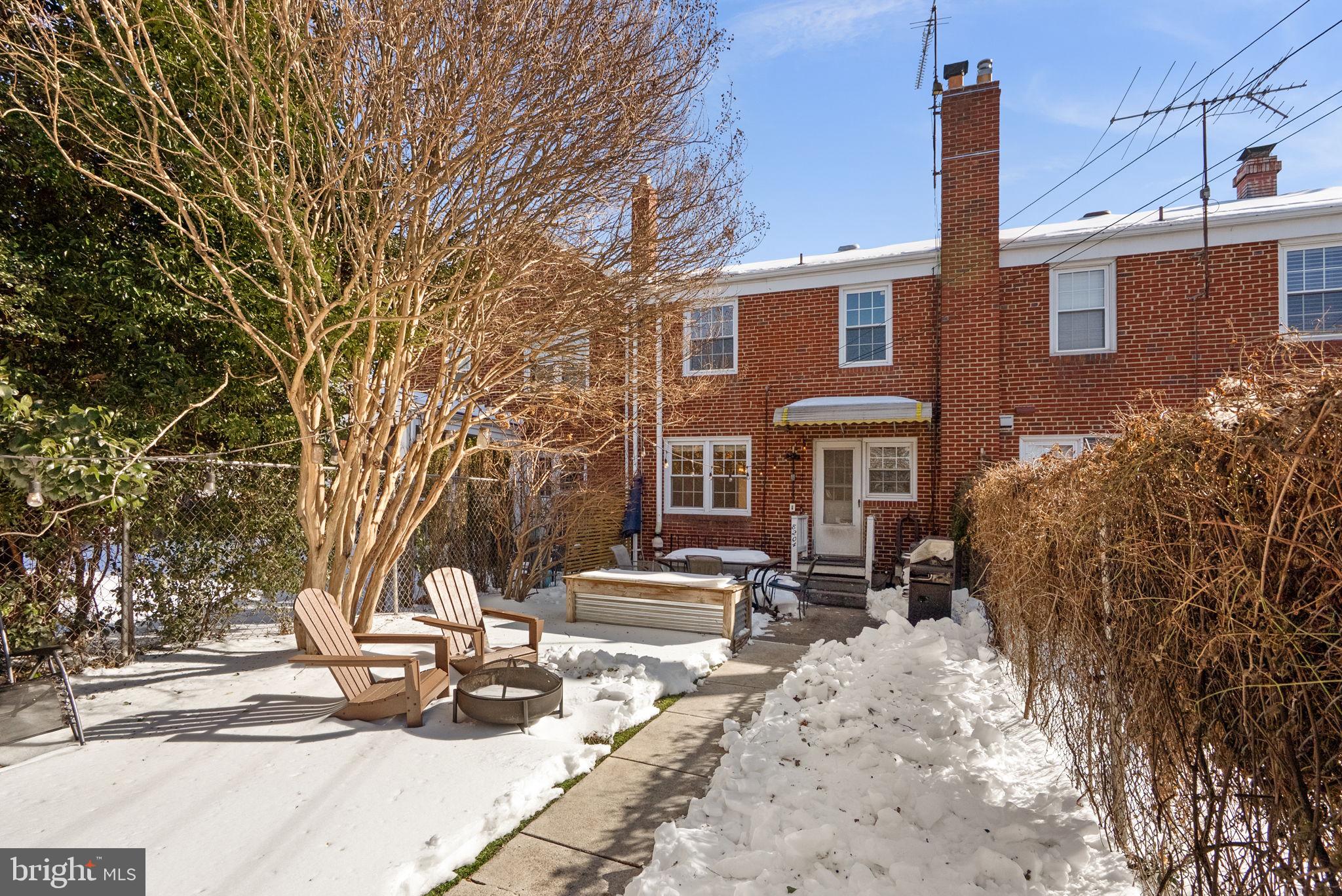 8204 Pleasant Plains Road Towson, MD 21286 - Photo 30 of 40 a front view of a house with cars parked
