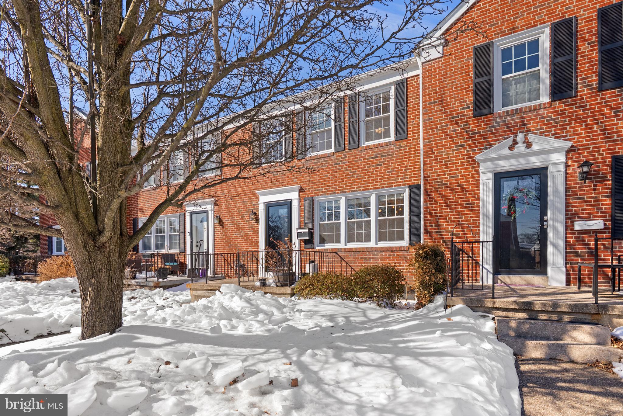 8204 Pleasant Plains Road Towson, MD 21286 - Photo 3 of 40 a front view of a house with a yard