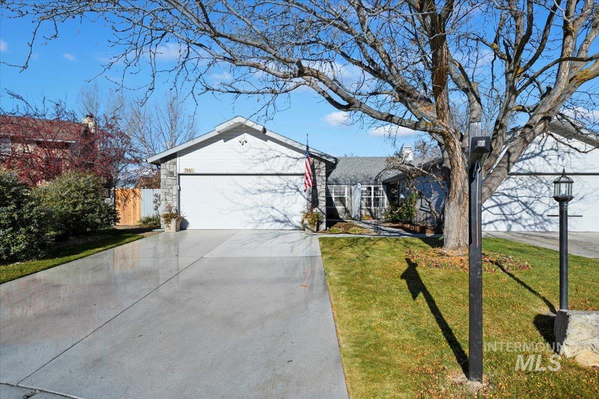 1981 North Interlachen Way Meridian, ID 83646 - Photo 1 of 24 Ranch-style house featuring driveway and a garage
