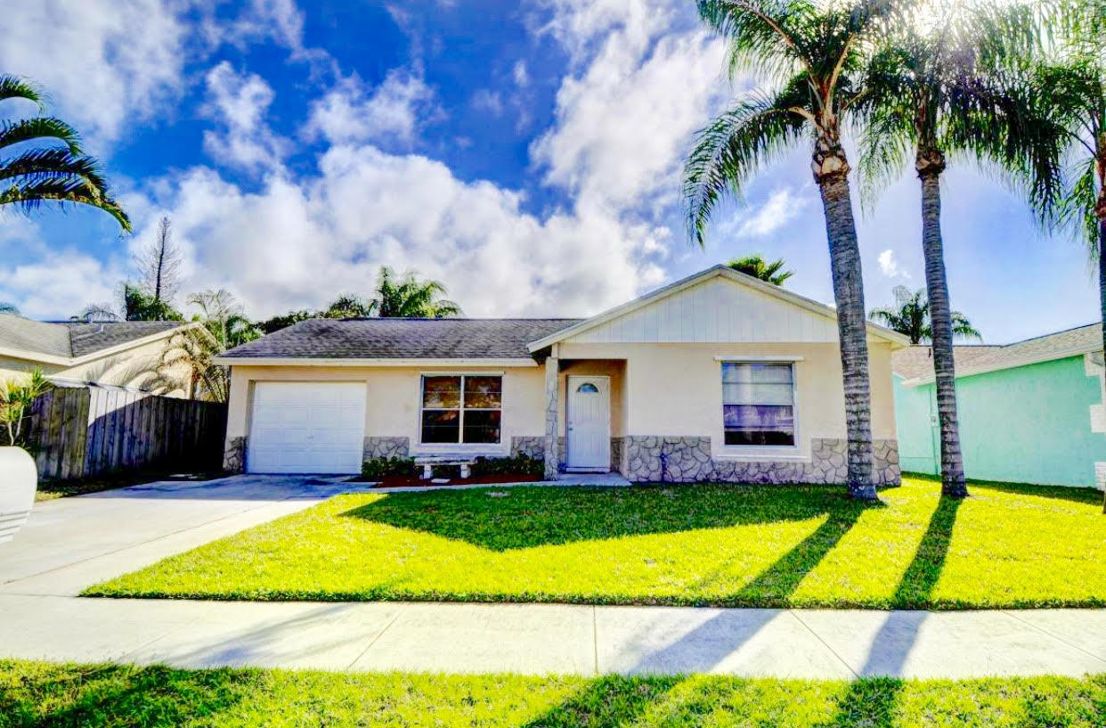 145 Banyan Circle Jupiter, FL 33458 - Photo 1 of 21 front