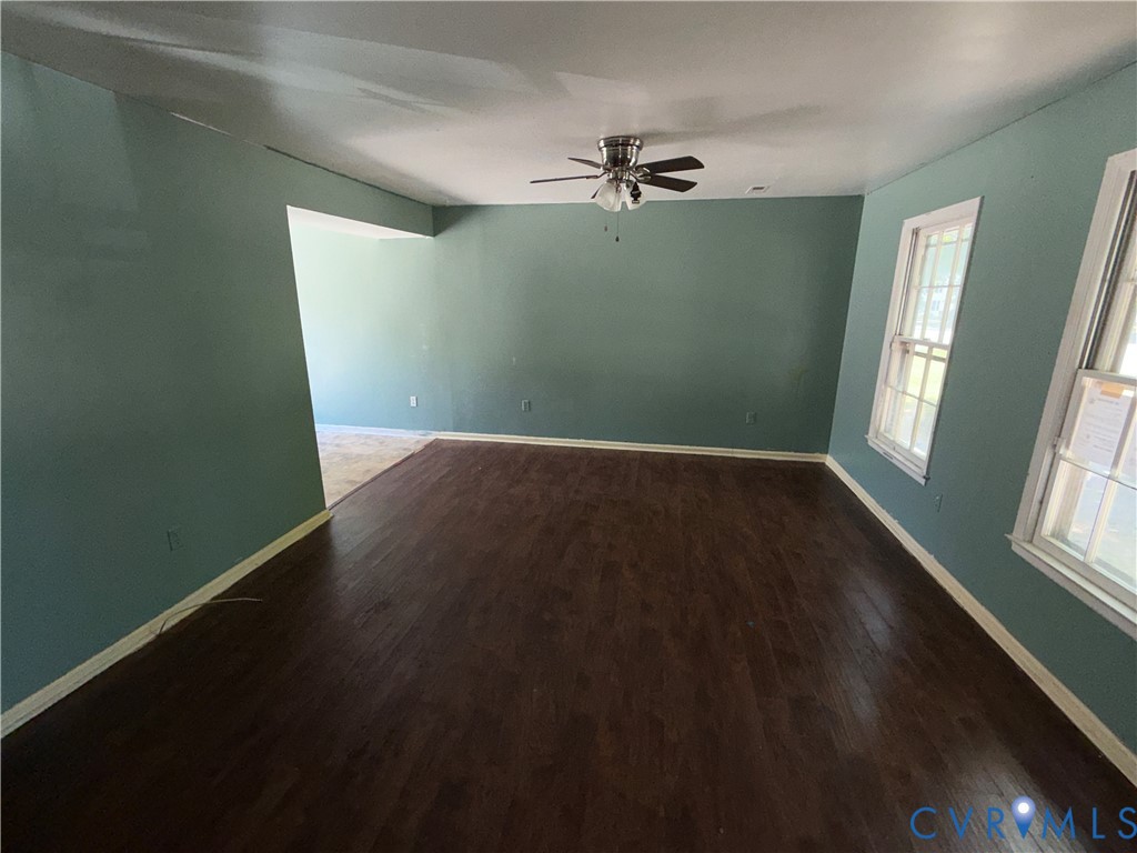 1607 Old Iron Road Hopewell, VA 23860 - Photo 4 of 12 a view of livingroom with hardwood floor and window