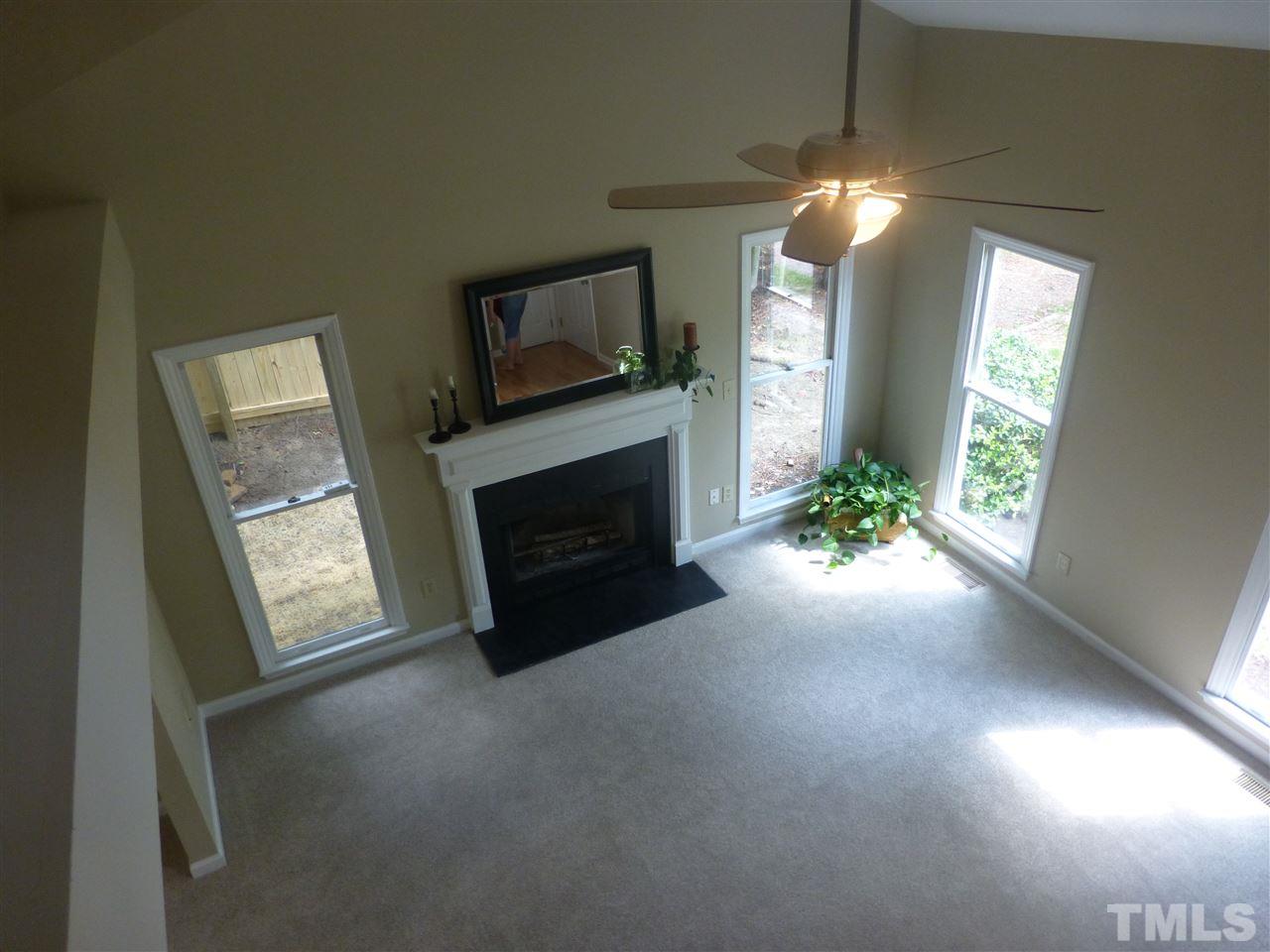 3612 Epperly Court Raleigh, NC 27616 - Photo 13 of 25 a view of a livingroom with a fireplace