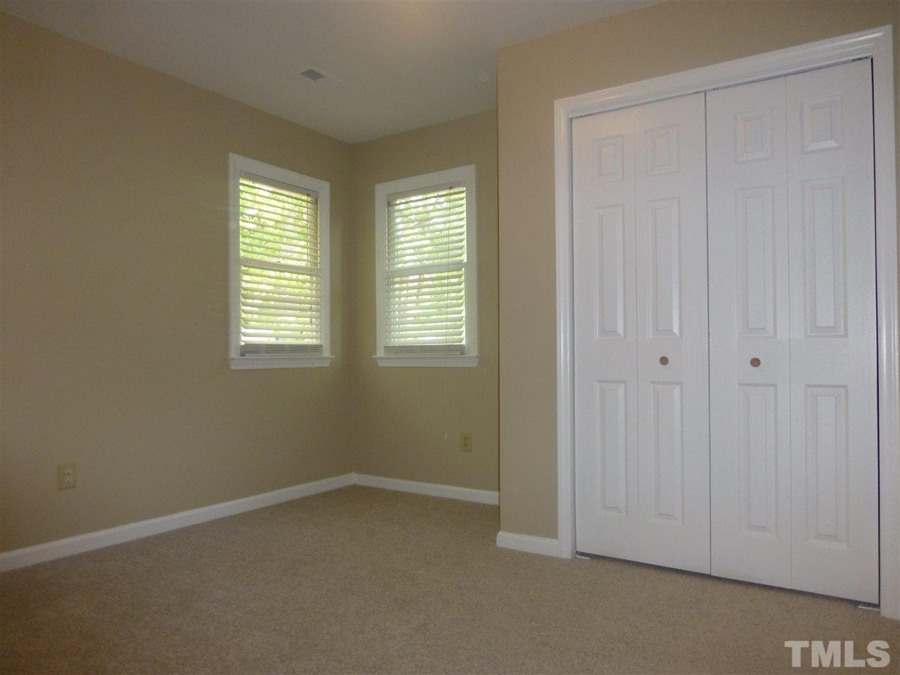 3612 Epperly Court Raleigh, NC 27616 - Photo 15 of 25 an empty room with windows
