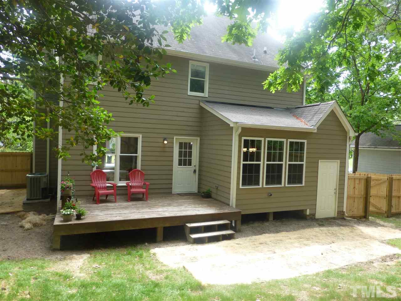 3612 Epperly Court Raleigh, NC 27616 - Photo 3 of 25 a backyard of a house with outdoor seating